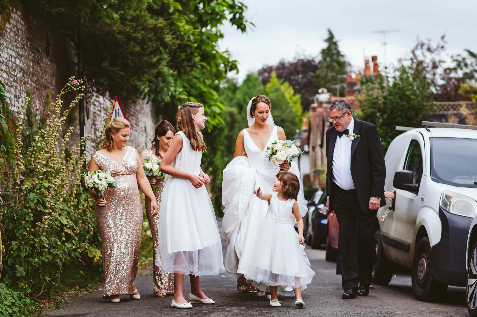 Bridal party walking to church