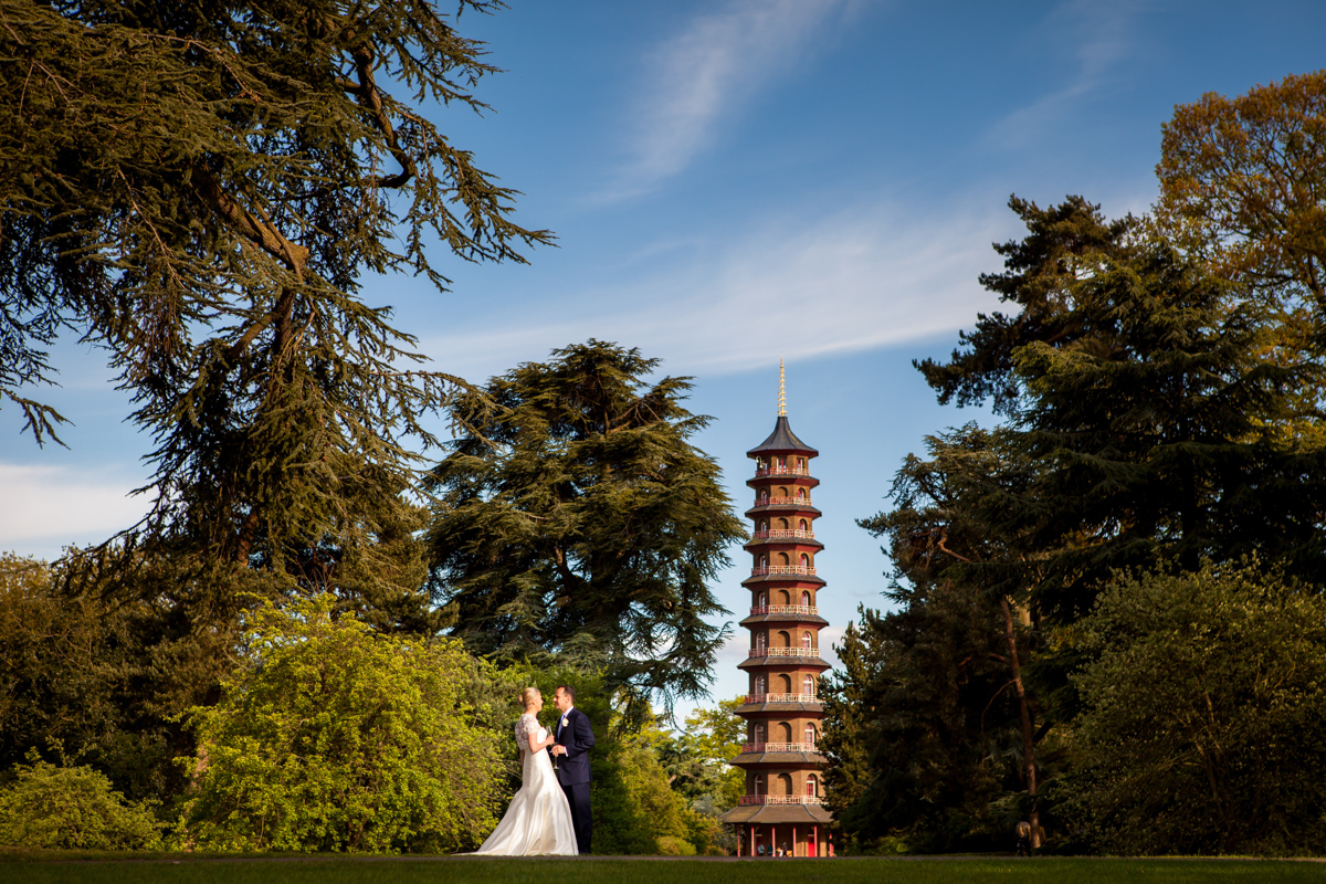 Bride and groom at great pagoda in Kew gardens