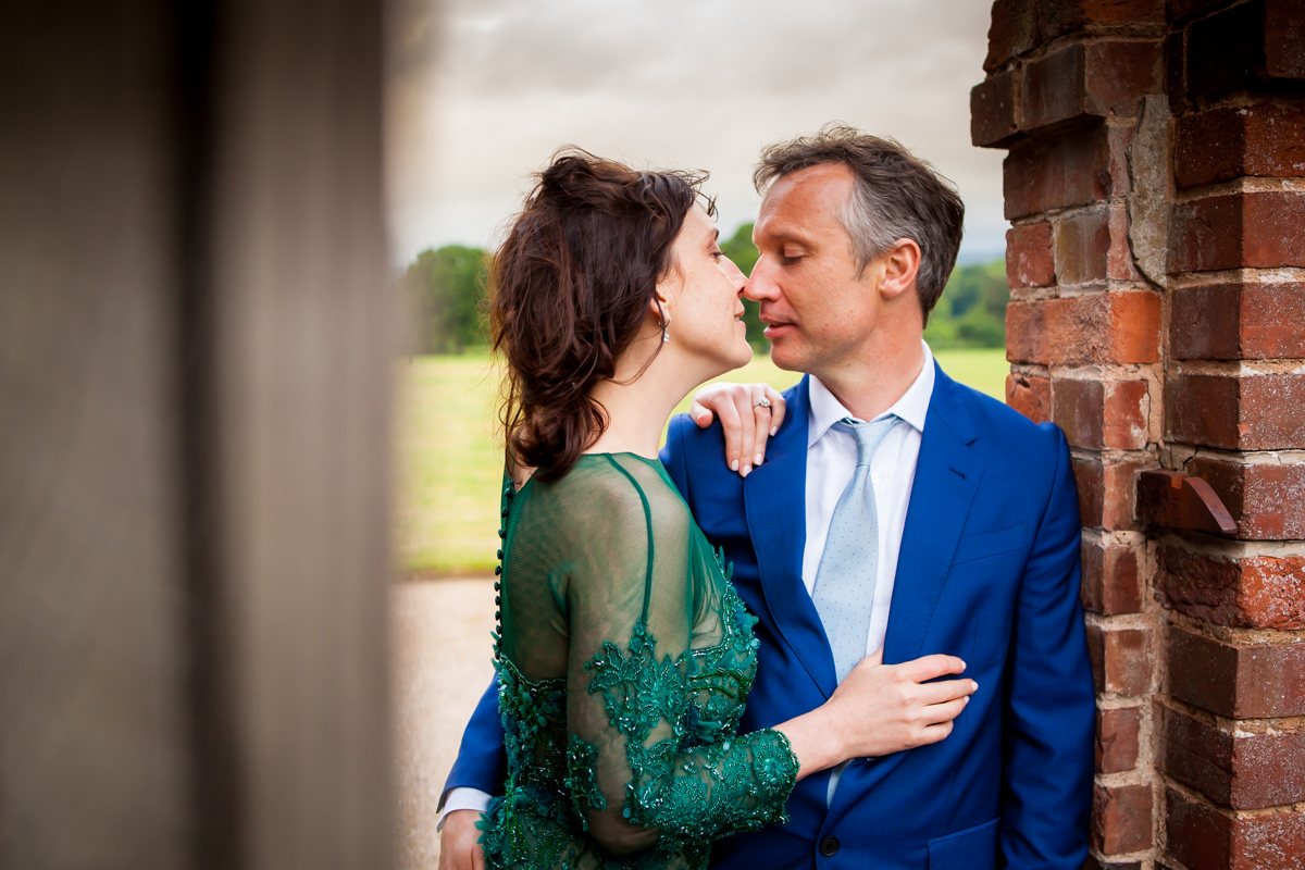 Bride in Green with groom in blue