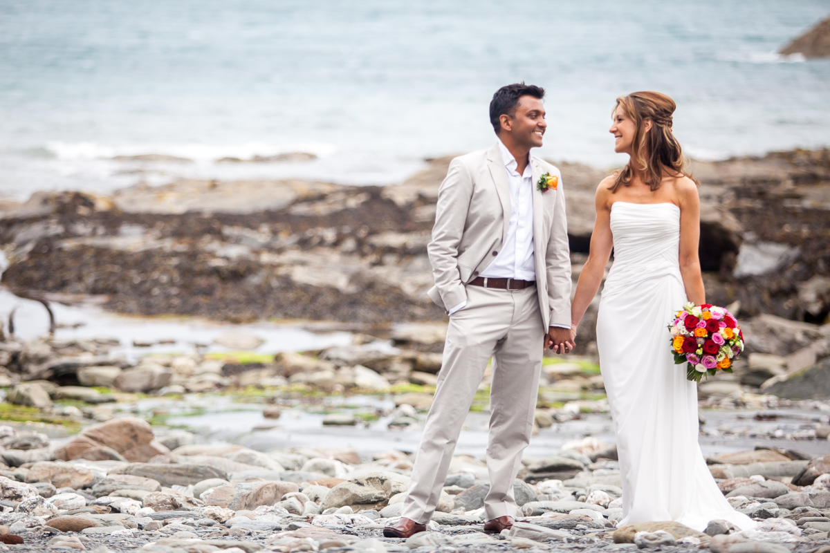 Bride and groom by the beach Infracombe tunnels