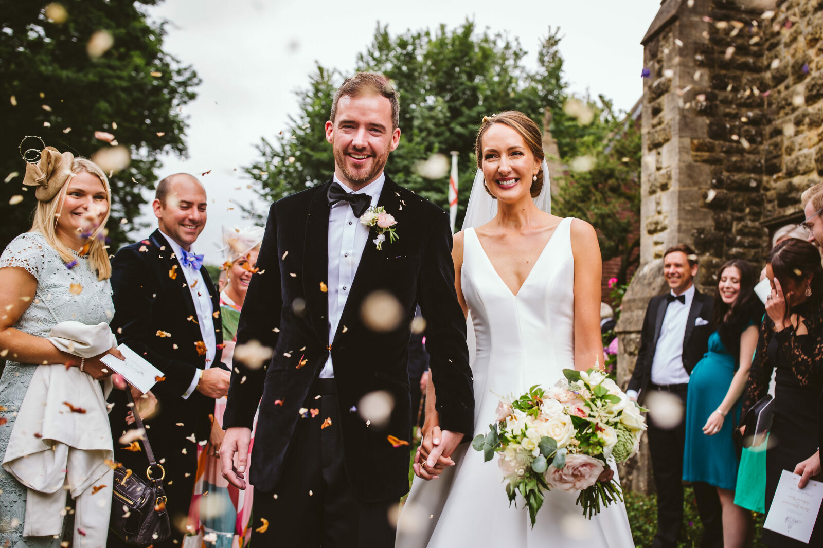 Bride and groom with confetti